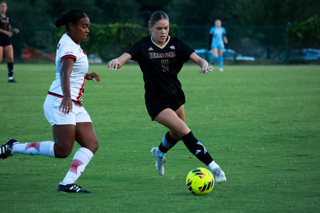 Texas State midfielder junior Lily Erb (11) accepts a pass from her teammate during the game against Incarnate Word, Sunday, Aug. 25, 2024, at Bobcat Soccer Complex.