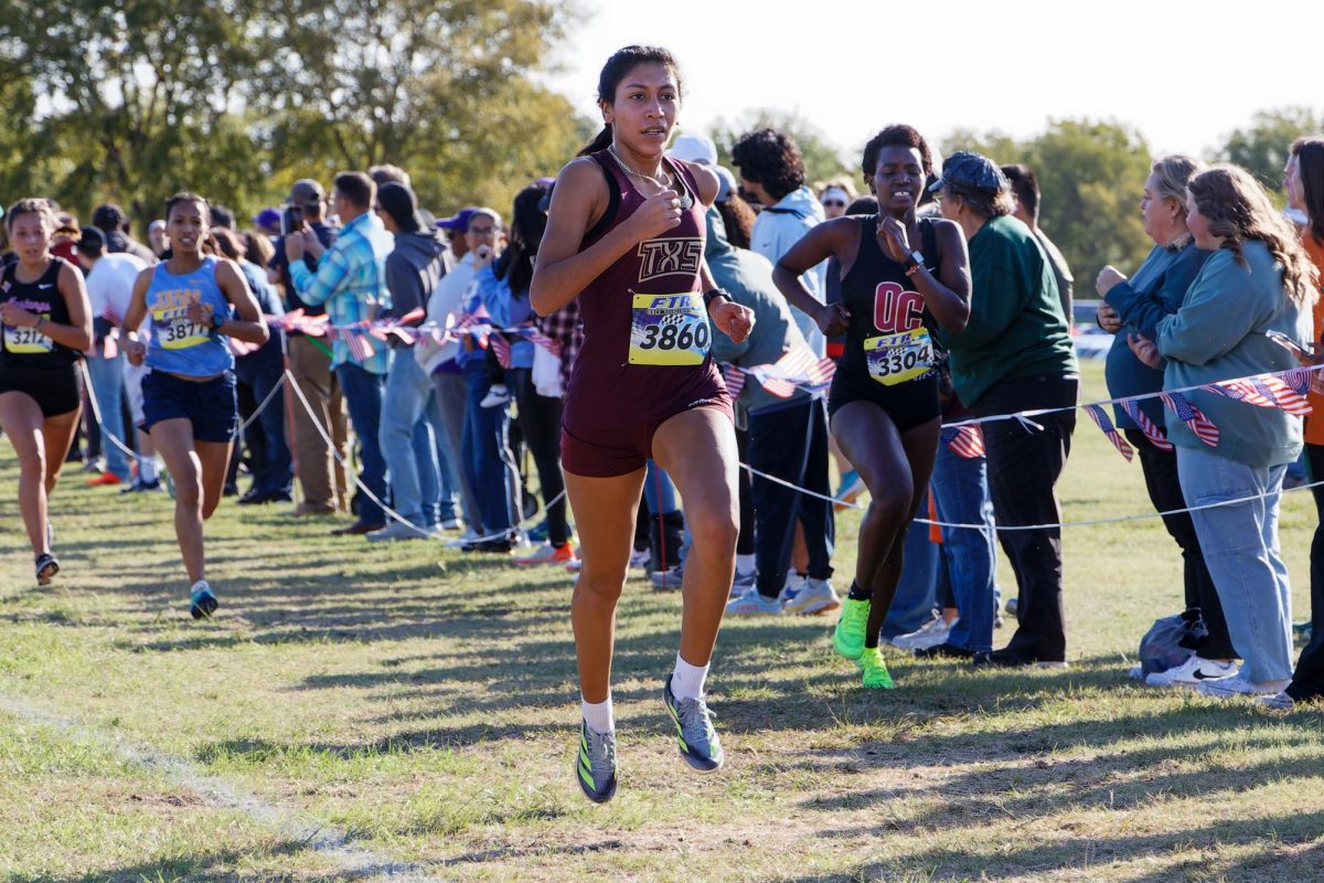 Sophomore runner Abigail Parra makes her way to the finish at the Old Glory Gallop in Grand Prairie, Texas, Saturday, October 7, 2023. 