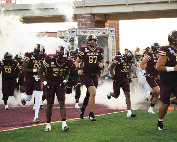 The Texas State football team runs onto the field prior to the game against Lamar, Saturday, Aug. 31, 2024, at Jim Wacker Field at UFCU Stadium. 