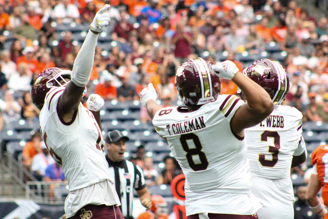 Texas State junior corner back Donte Thompson (16), senior defensive tackle Tavian Coleman (8), and senior defensive tackle Terry Webb celebrate a tackle for loss during the game against Sam Houston State, Saturday, Sept.28, 2024, at NRG Stadium in Houston. 