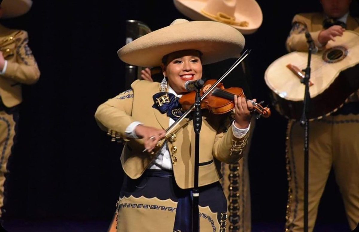 ENHS Mariachi Oro member Abigail Garcia performs her last high school mariachi concert, May 2022, at Edinburg North High School. Photo courtesy of Abigail Garcia.