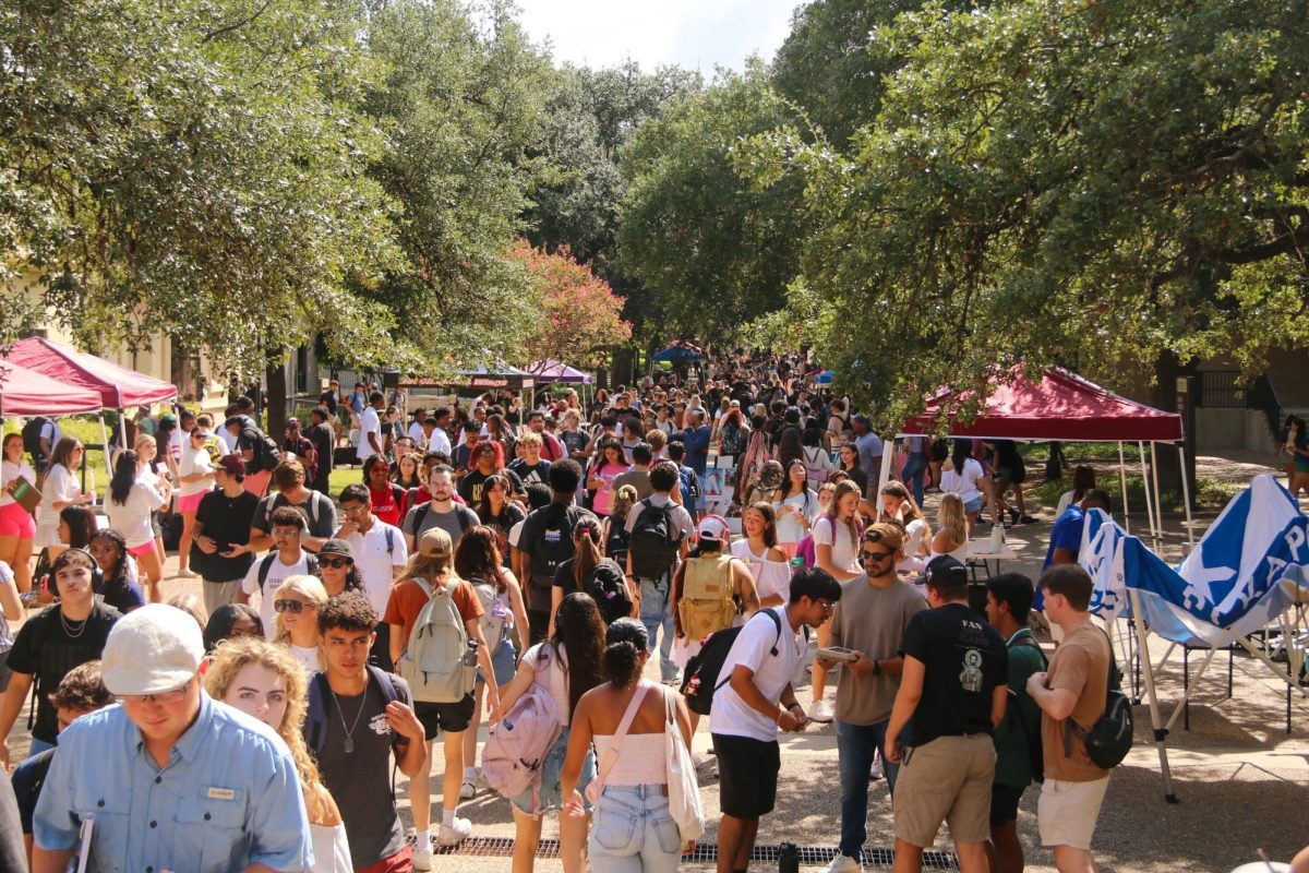 The Texas State campus is flooded with students walking to class on the first day of school, Monday, Aug. 26, 2024, at Bobcat Trail.