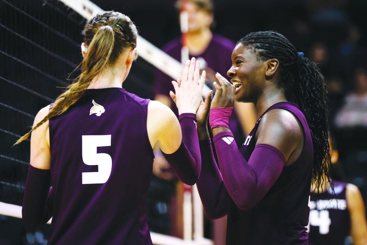 Texas State redshirt sophomore outside hitter Nina Moorer celebrates a point during the Maroon and Gold Scrimmage with her teammate, middle blocker Jade Defraeye (5),Saturday, August 24, 2024, at Strahan Arena. 