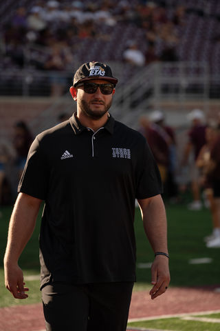 Texas State head football coach G.J. Kinne walks onto the field prior to the game against Lamar, Saturday, Aug. 31, 2024, at Jim Wacker Field at UFCU Field. 