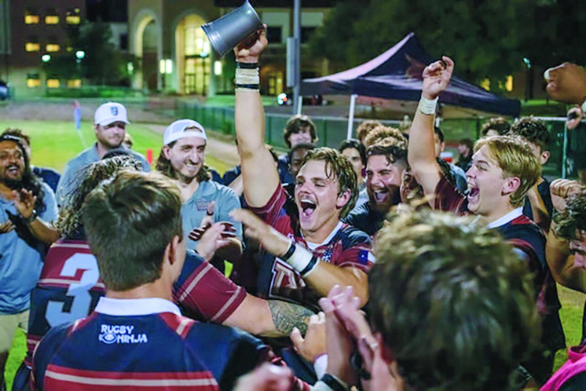 Texas State rugby member Cole Douglass celebrates victory over UTSA with his team, Friday, Sept. 27, 2024, at the West Campus Soccer Fields.