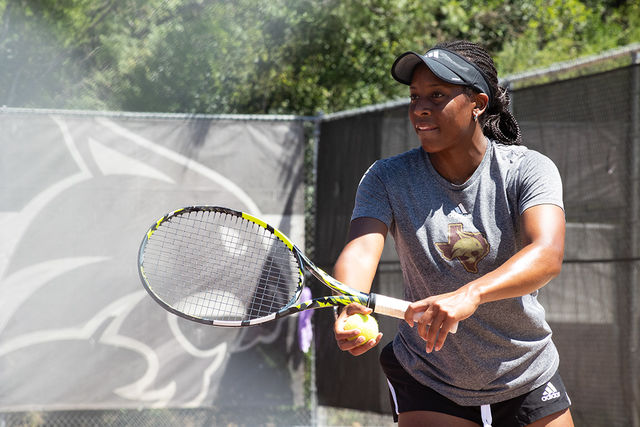 Texas State senior Kiana Graham prepares to serve the ball during her singles match at the Fall Invite Sunday, Sept. 8, 2024, at Bobcat Tennis Complex.