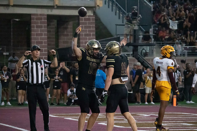 Texas State sophomore wide receiver Beau Sparks (11) celebrates his touchdown catch with senior wide receiver Joey Hobert (10) during the game versus Arizona State, Thursday, Sept. 12, 2024, at Jim Wacker Field at UFCU Stadium.