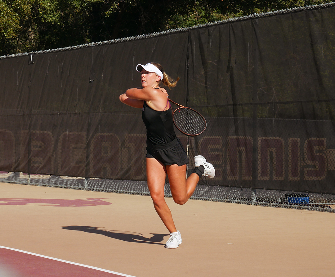 Texas State junior Emily Niers attempts to hit the ball during the match against Louisiana-Monroe, Saturday, Oct. 26, 2024, at Bobcat Tennis Complex.