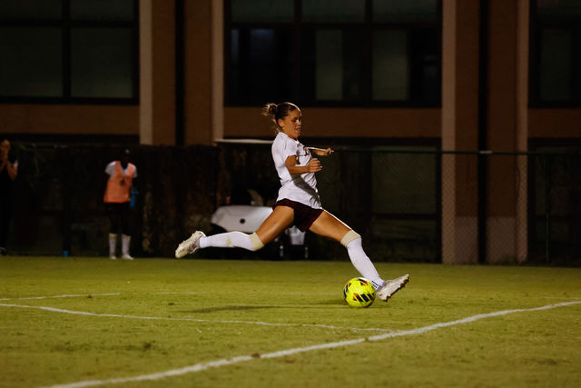 Texas State junior midfielder Lily Erb (11) passes the ball to a teammate during the match against Marshall, Thursday, Sept. 26, 2024, at Bobcat Soccer Complex.