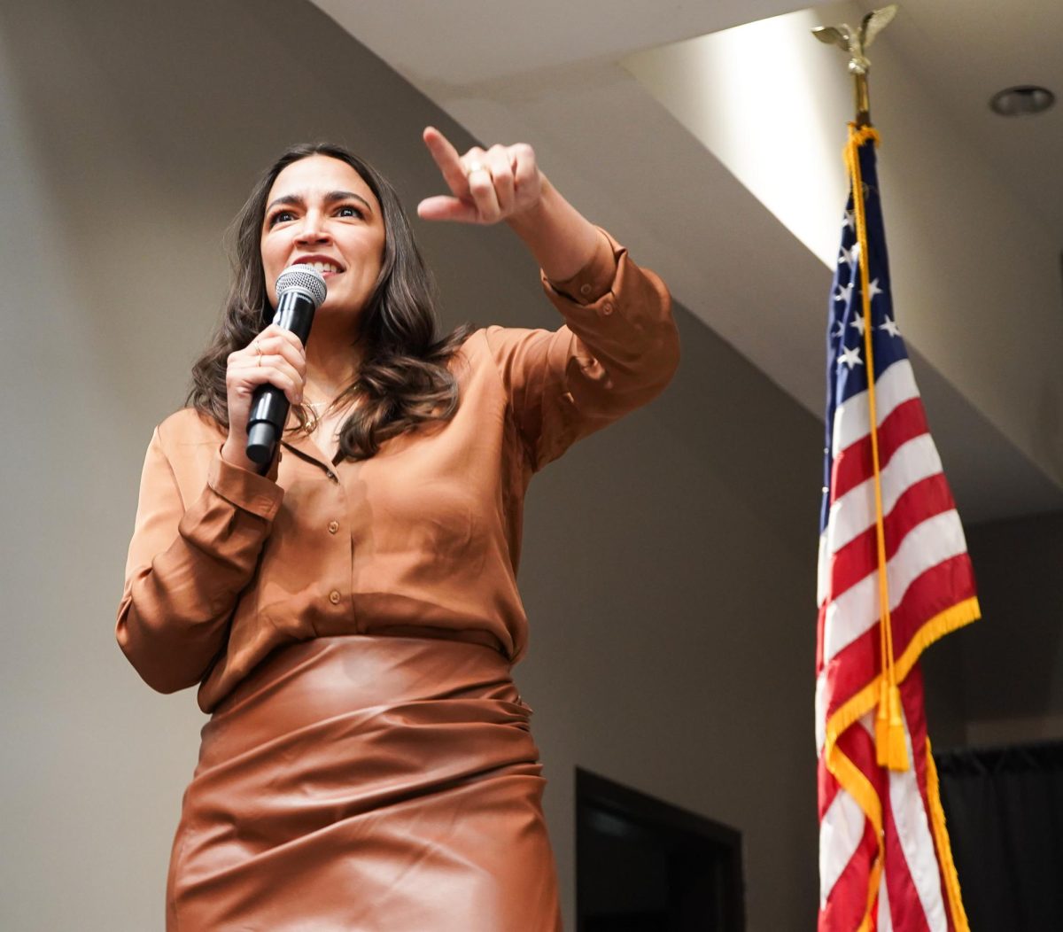 U.S. Representative Alexandria Ocasio-Cortez speaks to a crowd of people, Tuesday, Oct. 1, 2024, at the LBJ Ballroom. Ocasio-Cortez was in San Marcos for the "Our Fight Our Future" rally run by the College Democrats at Texas State.