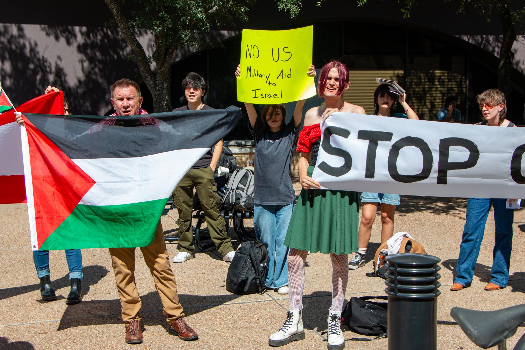 Community members hold protest to counter Democratic rally at TXST