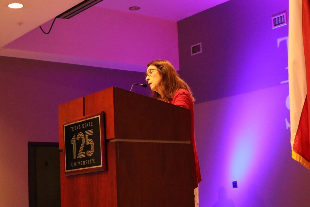 Mayor Jane Hughson discusses his platform for mayor at a debate, Monday, Oct. 14 at LBJ Ballroom.