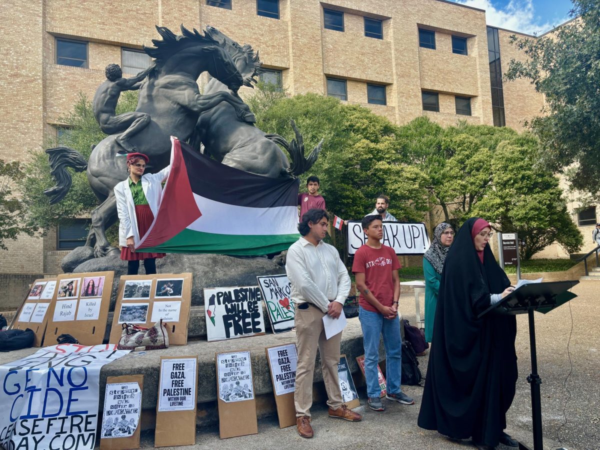 Local activist Amanda Smith speaks at press conference condemning President Kelly Damphousse for comments on pro-Palestine graffiti, Monday, Oct. 28, at the Stallions statue.