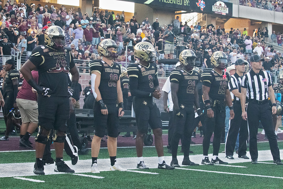 The Texas State football team captains prepare for the coin flip with Arizona State, Thursday, Sept. 12, 2024, at Jim Wacker Field at UFCU Stadium.