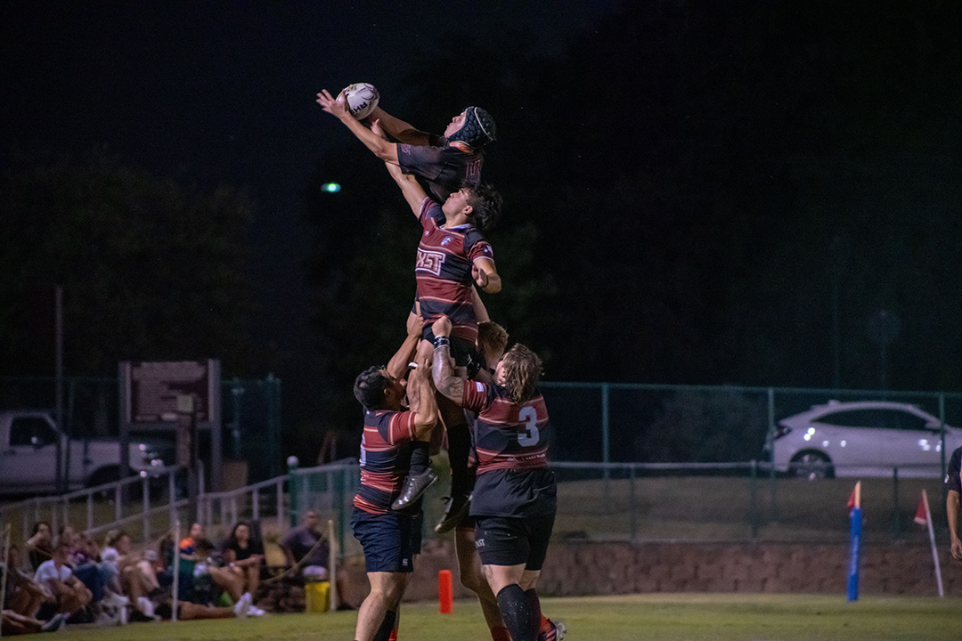 Texas State rugby players pile up during a line-out in a match against UTSA, Friday, Sept. 27, 2024, at the west campus fields. 