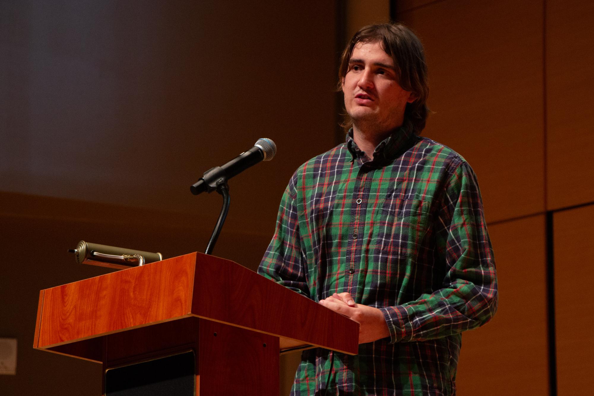 Social work graduate student Sean O'Connor discusses his moral dilemma working for an opioid manufacturer while recovering from alcoholism during Star Stories, Wednesday, Oct. 23, 2024, at the Performing Arts Center.