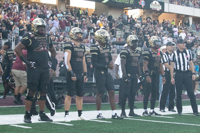 The Texas State football team captains prepare for the coin flip with Arizona State, Thursday, Sept. 12, 2024, at Jim Wacker Field at UFCU Stadium.