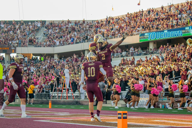 Texas State junior wide receiver Kole Wilson (2) celebrates in the end zone with his teammates following his 53-yard touchdown reception during the game versus Arkansas State, Saturday, Oct. 12, 2024, at Jim Wacker Field at UFCU Stadium.