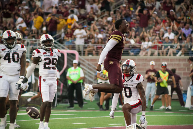 Texas State redshirt senior quarterback Jordan McCloud celebrates in the end zone after a rushing touchdown during the game versus Arkansas State, Saturday, Oct. 12, 2024, at Jim Wacker UFCU Stadium.