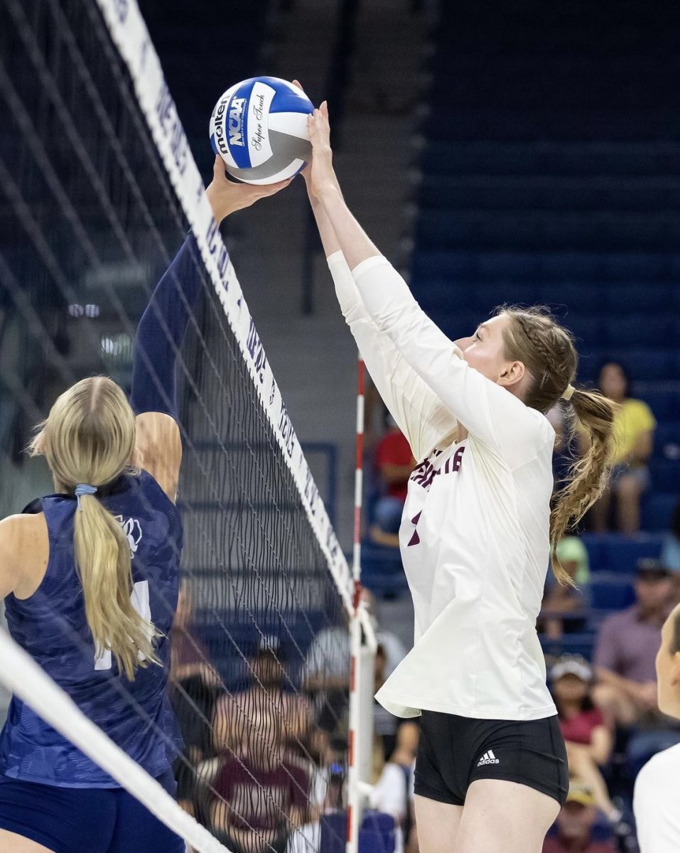 Texas State junior middle blocker Jade Defraeye blocks a kill attempt during the season opener against Houston Christian, Friday, Aug. 30, 2024, at Tudor Fieldhouse in Houston. 