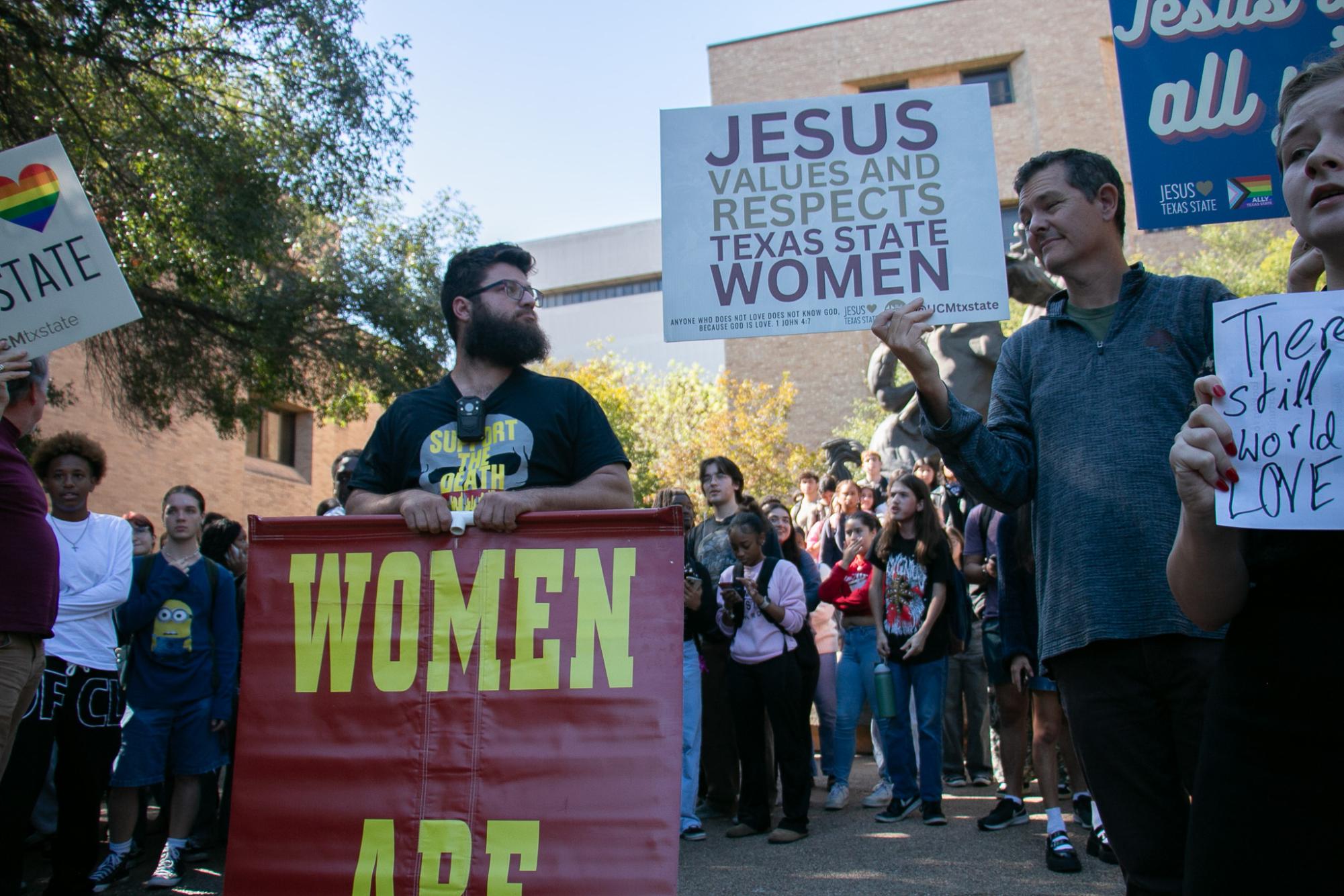 (Photo Gallery) - Demonstrators spark counter-protest of hundreds at TXST