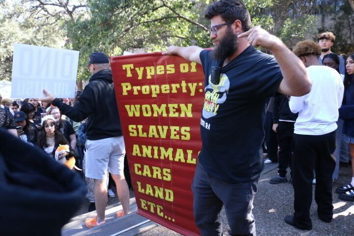 (Photo Gallery) - Demonstrators spark counter-protest of hundreds at TXST