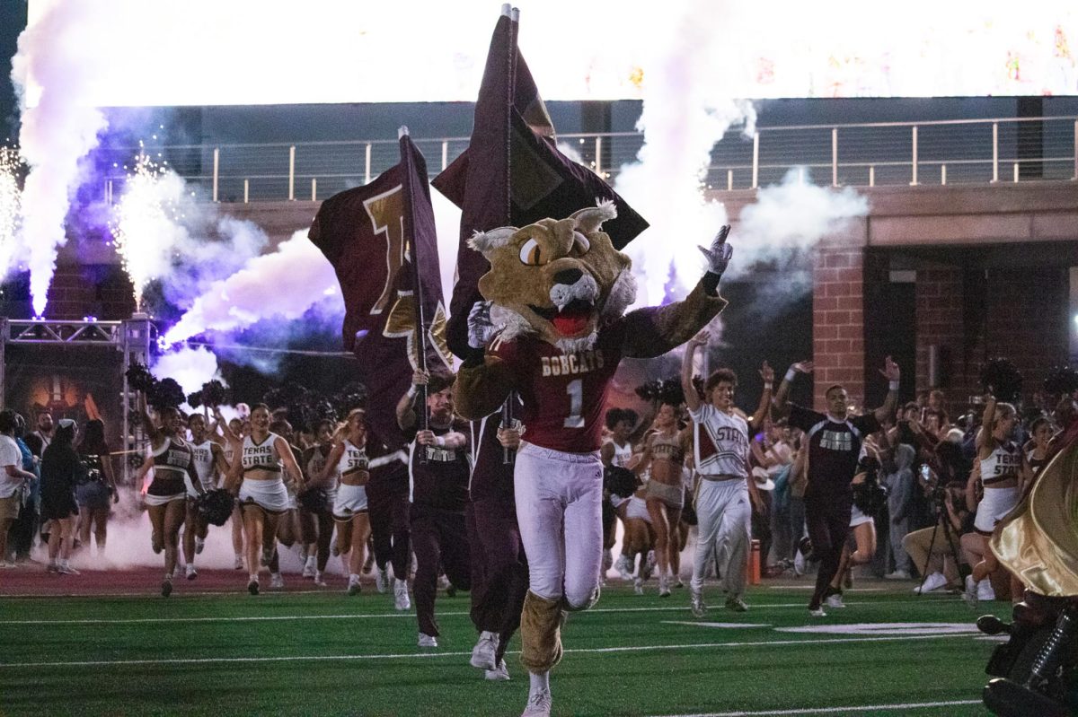 Boko leads the Texas State football team out onto the field to kickoff the Homecoming game to face the Golden Eagles, Saturday, Nov. 17, 2024, at UFCU Stadium.