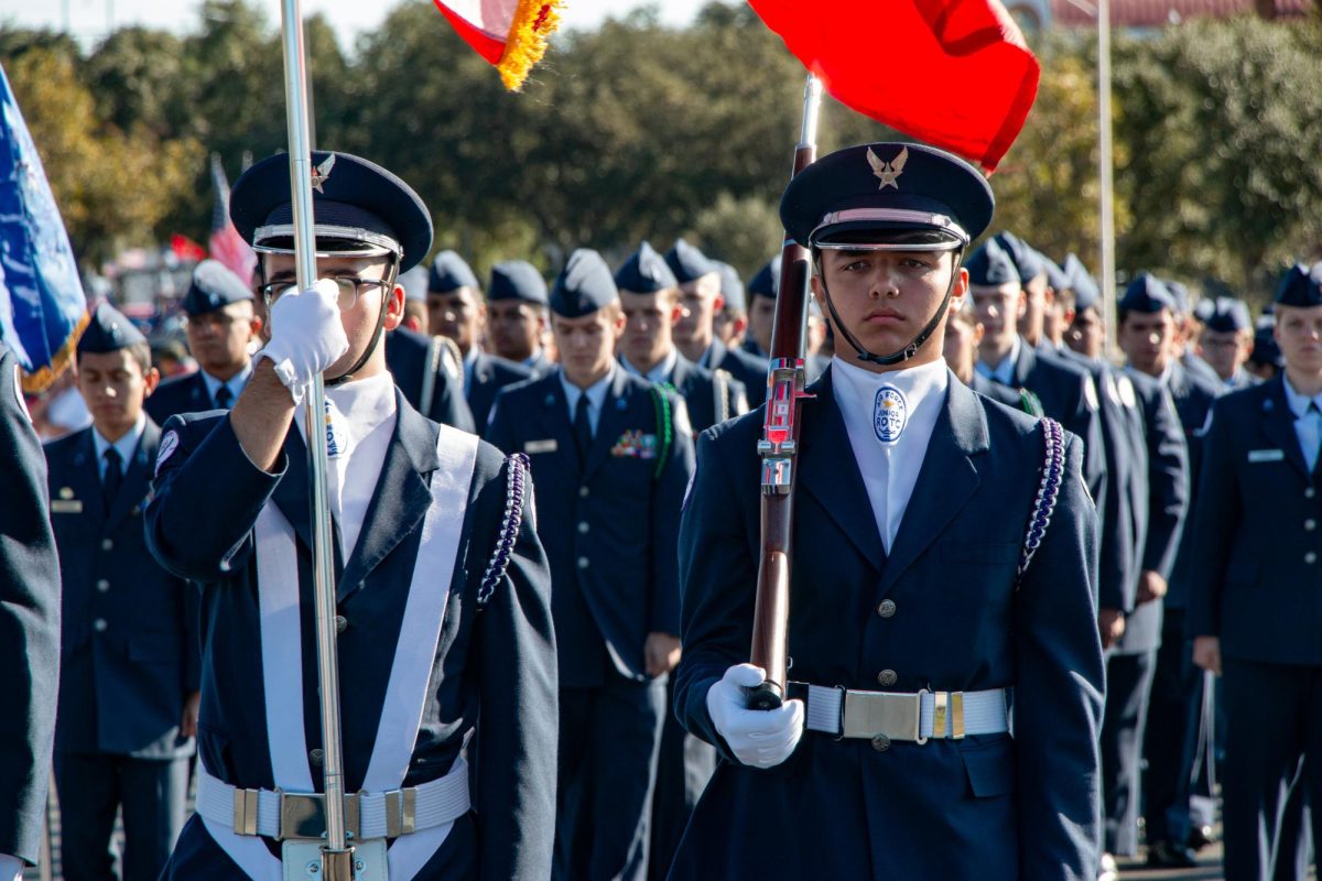 The Air Force Junior ROTC TX-921 of San Marcos High School stand at attention during the Veterans Day Parade in downtown San Marcos, Saturday, Nov. 9, 2024.