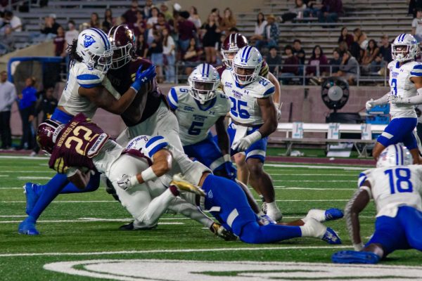 Navigation to Story: Veilleux and Brock combine for six touchdowns to take down Texas State on senior night