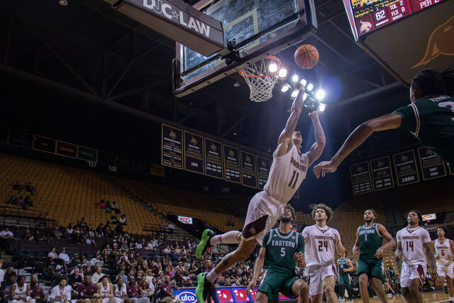 Texas State sophomore guard Kaden Gumbs (11) attempts a layup during the game against Eastern Michigan. Monday, Nov. 11, 2024, at Strahan Arena.