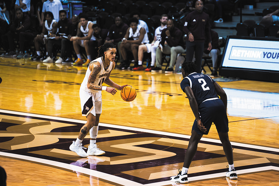 Texas State point guard sophomore Kaden Gumbs (11) marches down court against Georgia Southern, Saturday, Dec. 21, 2024 at Strahan Arena.