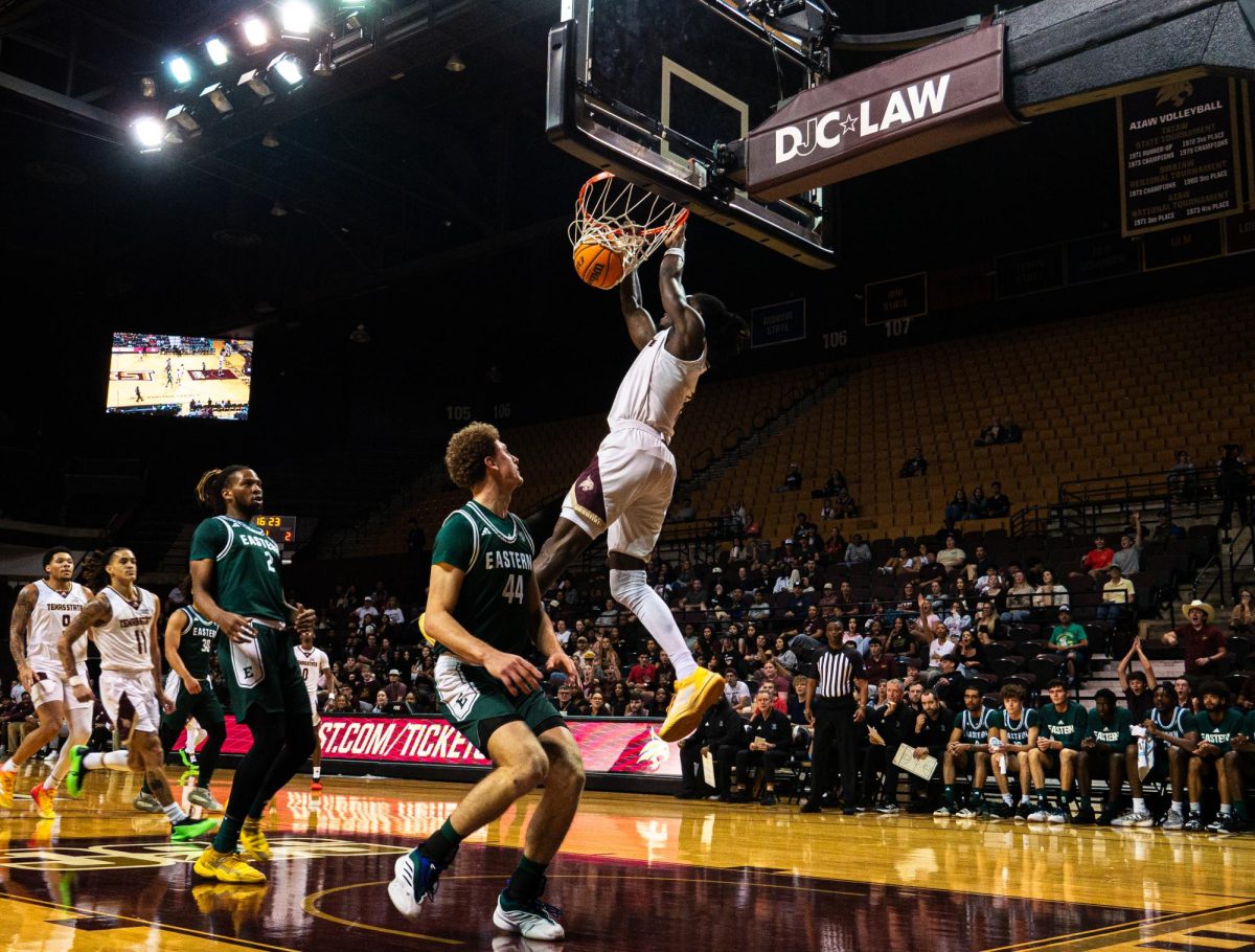 Texas State Graduate forward Tyrel Morgan (1) dunks the ball against Eastern Michigan in Texas State vs. Eastern Michigan on Monday, Nov. 4, 2024, at Strahan Arena.