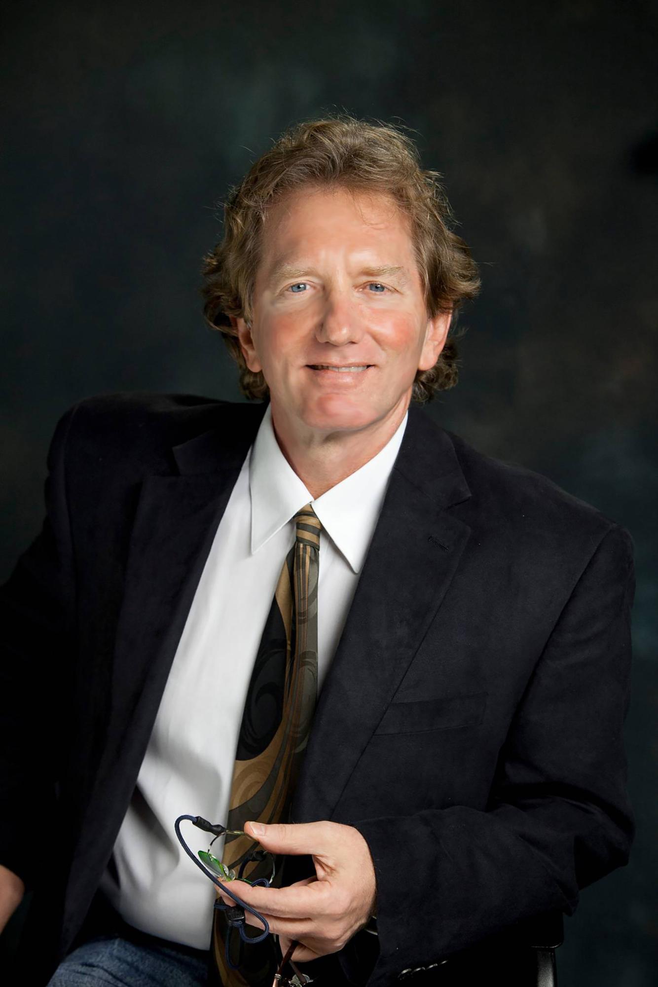 Associate professor Hank Hehmsoth poses for a photo, Tuesday, June 23, 2015, at the Music Building. Photo courtesy of Texas State University.