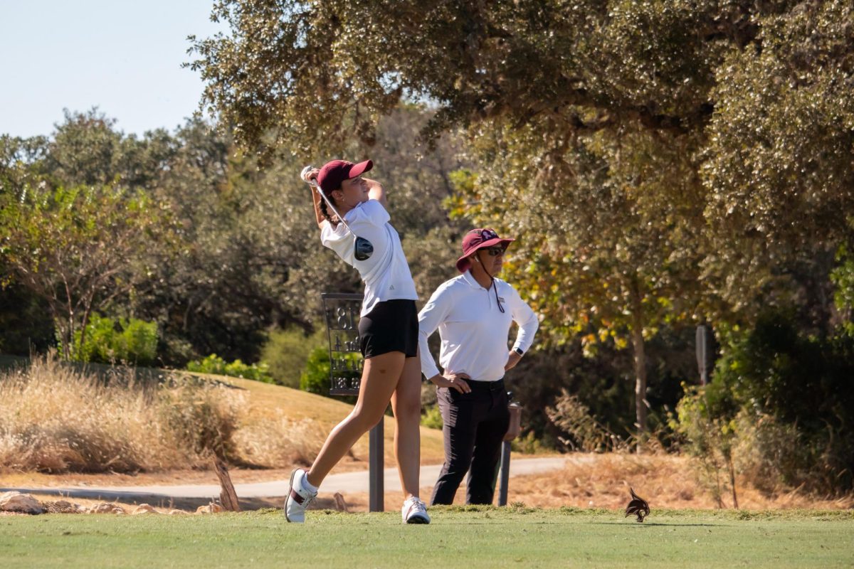 Texas State freshman women's golfer Allie Justiz drives the ball at hole 18 at the Kissing Tree Golf Club in San Marcos during the Jim West Challenge. Sunday, Oct. 20, 2024.