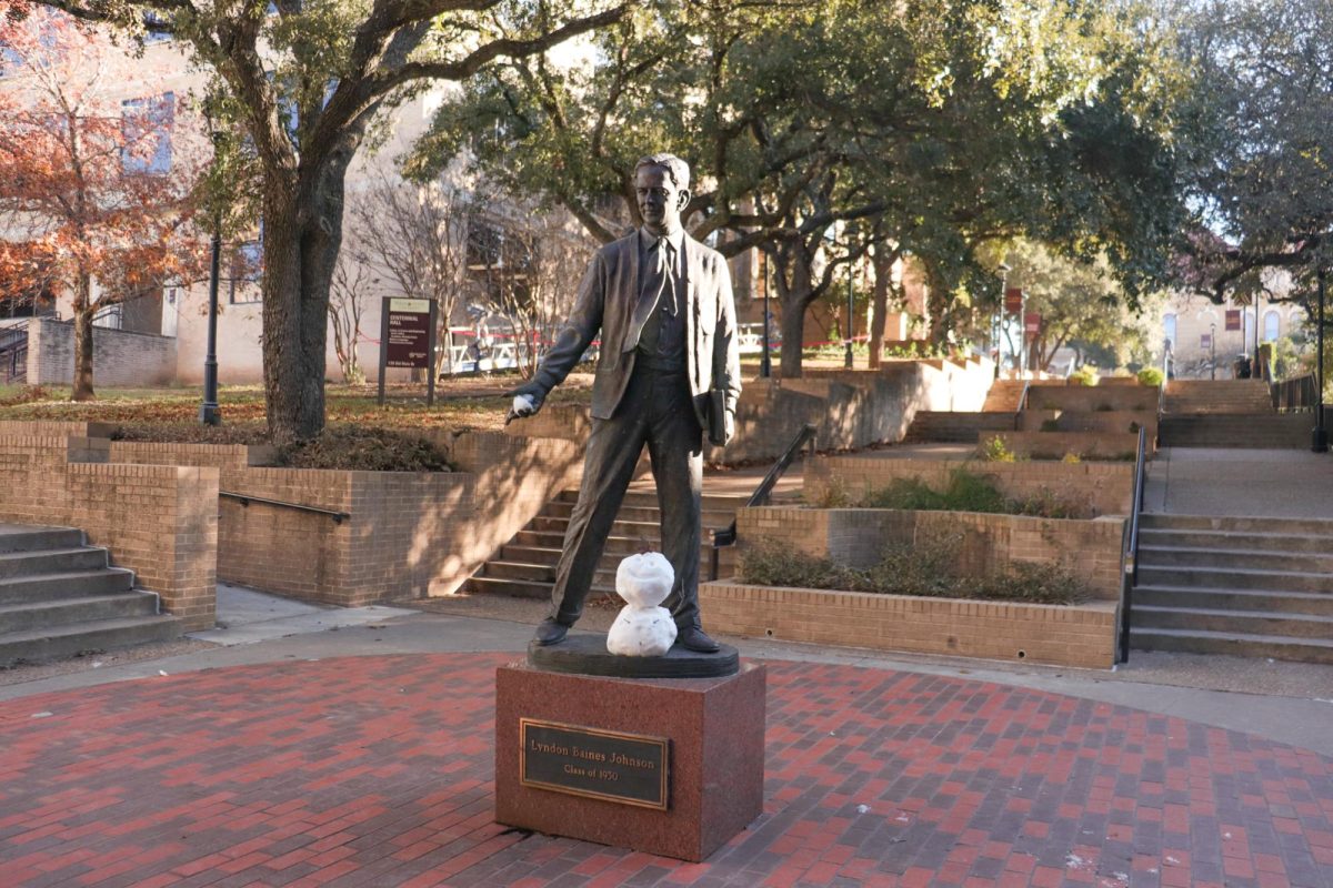 Texas State's statue of LBJ is decorated with a snowman, Wednesday, Jan. 22, 2025 at the Quad.