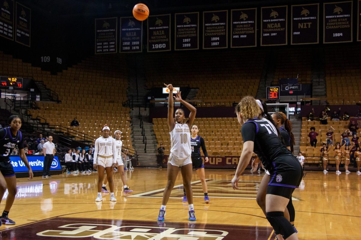 Texas State graduate guard Destiny Terrell (10) shoots a free-throw during the fourth quarter of the game against James Madison University, Saturday, Jan. 4, 2025, at Strahan Arena.