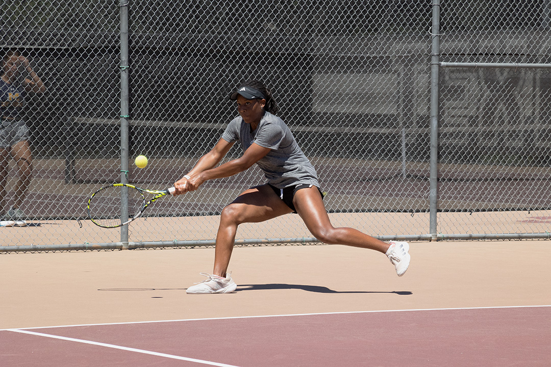 Texas State senior Kiana Graham rushes for the ball during her singles match at the Fall Invite Sunday, Sept. 8, 2024, at Bobcat Tennis Complex.