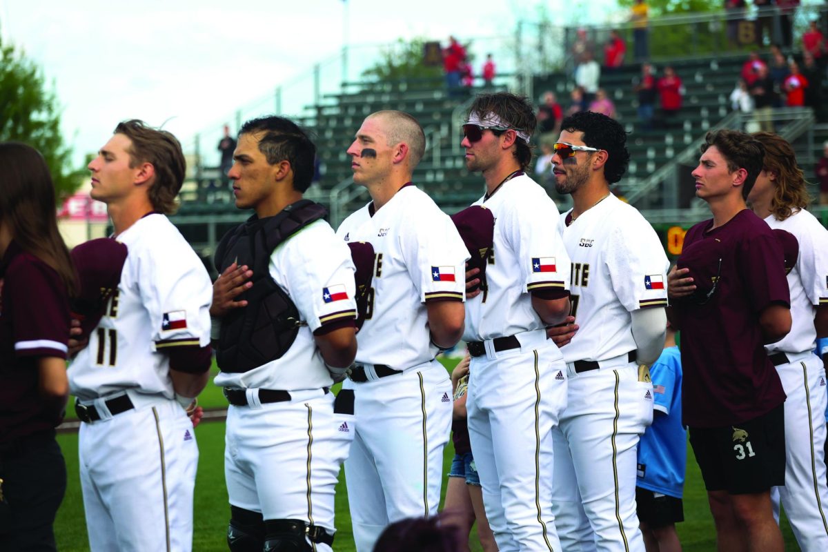 The Texas State baseball team stands for the national anthem before their game against the University of Louisiana-Lafayette, Friday, March 29, 2024, at Bobcat Ballpark. Bobcats lost to the Ragin' Cajuns 16-5.