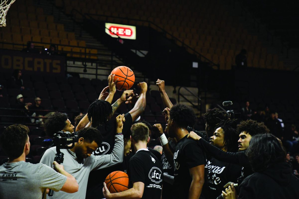 The Texas State men's basketball team huddles before their game against Georgia State, Wednesday, Jan. 15 at Strahan Arena.