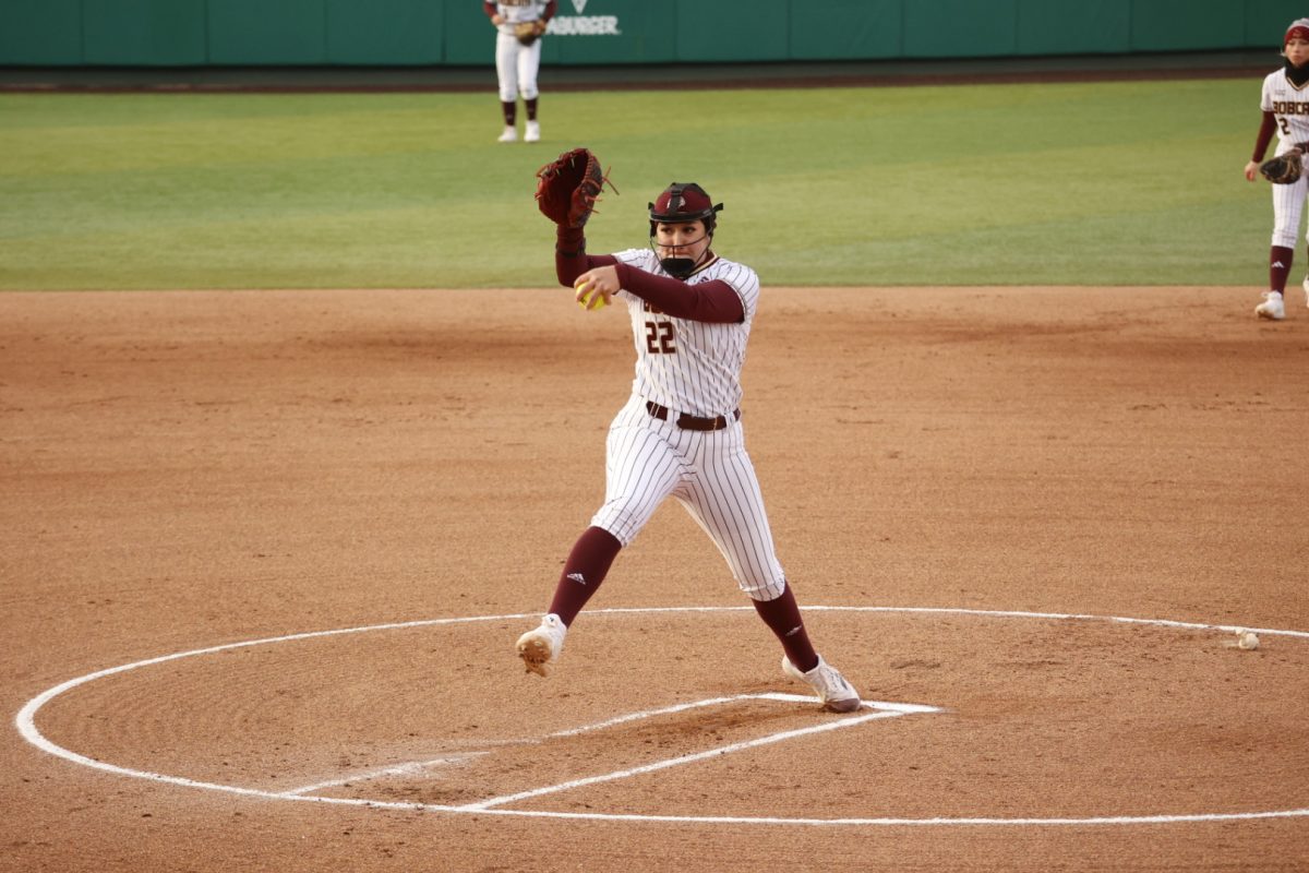 Texas State pitcher sophomore Maddy Azua (22) pitches the ball during the game against Stephan F. Austin, Thursday, Feb. 13, 2025, at Bobcat Softball Stadium. Bobcats beat the Lumberjacks 3-1.