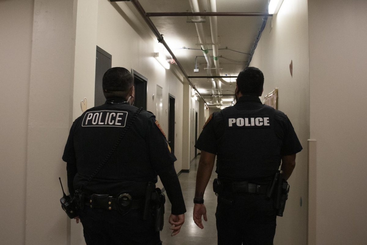 University Police Department Sgt. Gilbert Verastegui (Left) and Officer David Velasco Martinez (Right) patrol Alamito Hall, Friday, Feb. 14, 2025.  UPD conducts daily walkthroughs of all dorms.