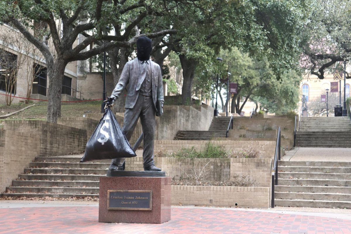 LBJ Statue is decorated as a robber by communication design senior Yasseen Elassar, Wednesday, Feb. 5, 2025 at the Quad. This project was apart of a design class. 