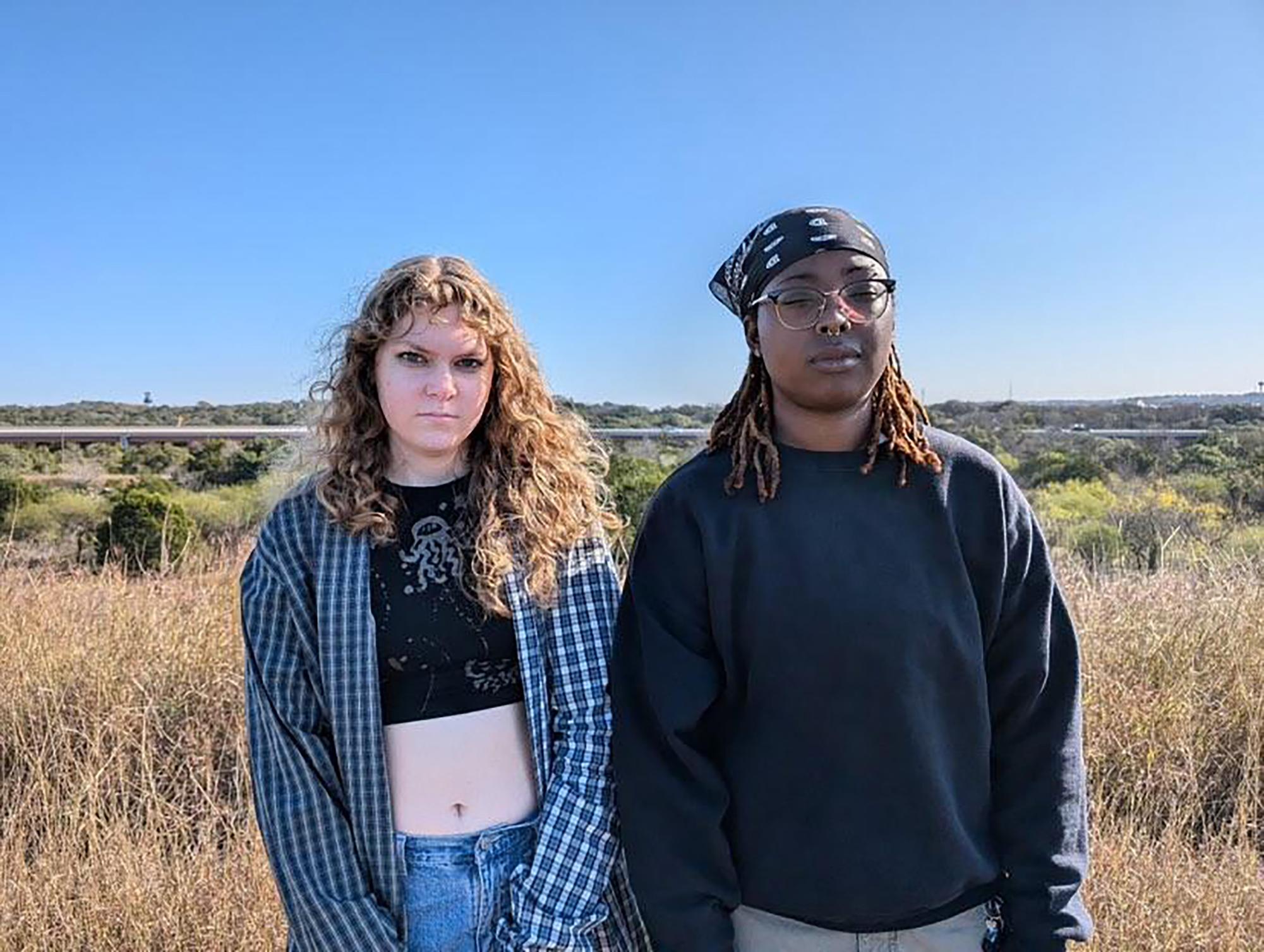 Communication studies junior Beau Borgneyer (Left) and history and education junior Tiara Fowler (Right) pose for a photo during their hike, Thursday, Dec. 19, 2024, at Purgatory Creek. Photo courtesy of Lydia Deolloz.