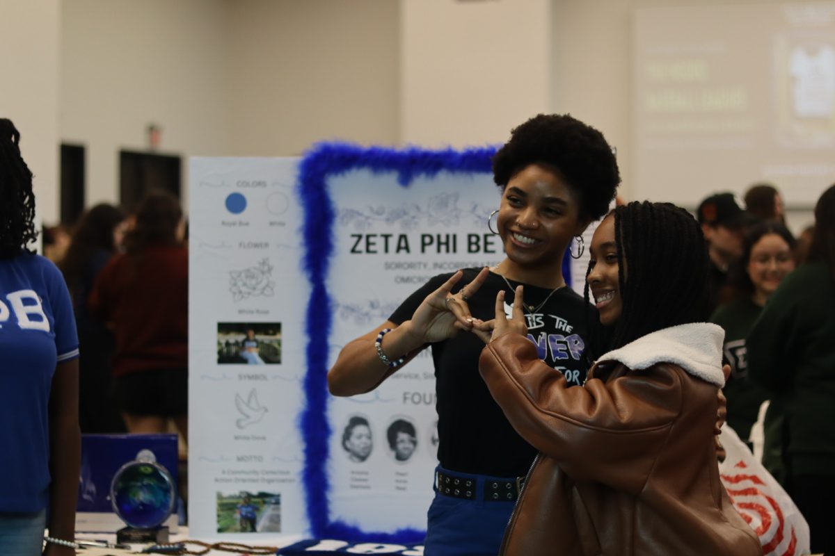 Texas State civil engineering sophomore Olivia Archie (Right) and fashion merchandising junior Jasmine Franklin (Left) represent Zeta Phi Beta at the Student Involvement Fair, Thursday, Jan. 30, 2025, at LBJ Student Center. Zeta Phi Beta is a sorority which serves African American students.  