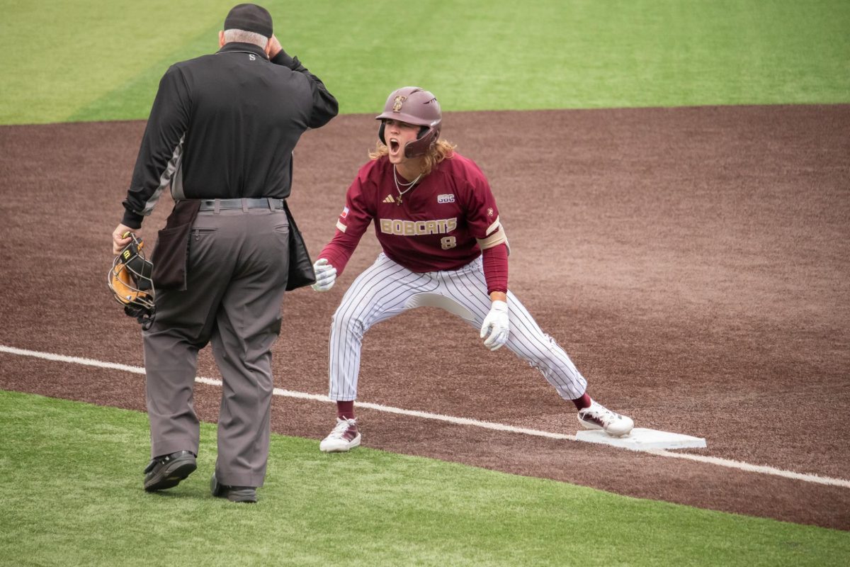 Texas State sophomore outfielder Samson Pugh (8) celebrates reaching third base, Sunday, Feb. 23, 2025 at Bobcat Ballpark. Bobcats beat Illinois 5-2.