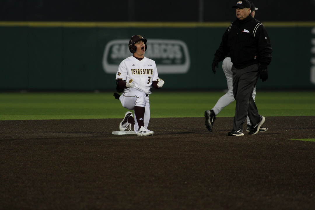 Sophomore shortstop Ryne Farber (3) cheers after hitting a double during the game against Binghamton at Bobcat Ballpark Friday, Feb. 14, 2025.