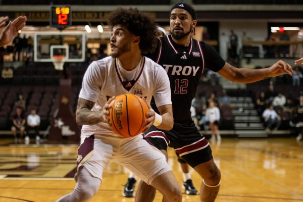 Navigation to Story: Tayton Conerway shines as Bobcats fall to Trojans at home