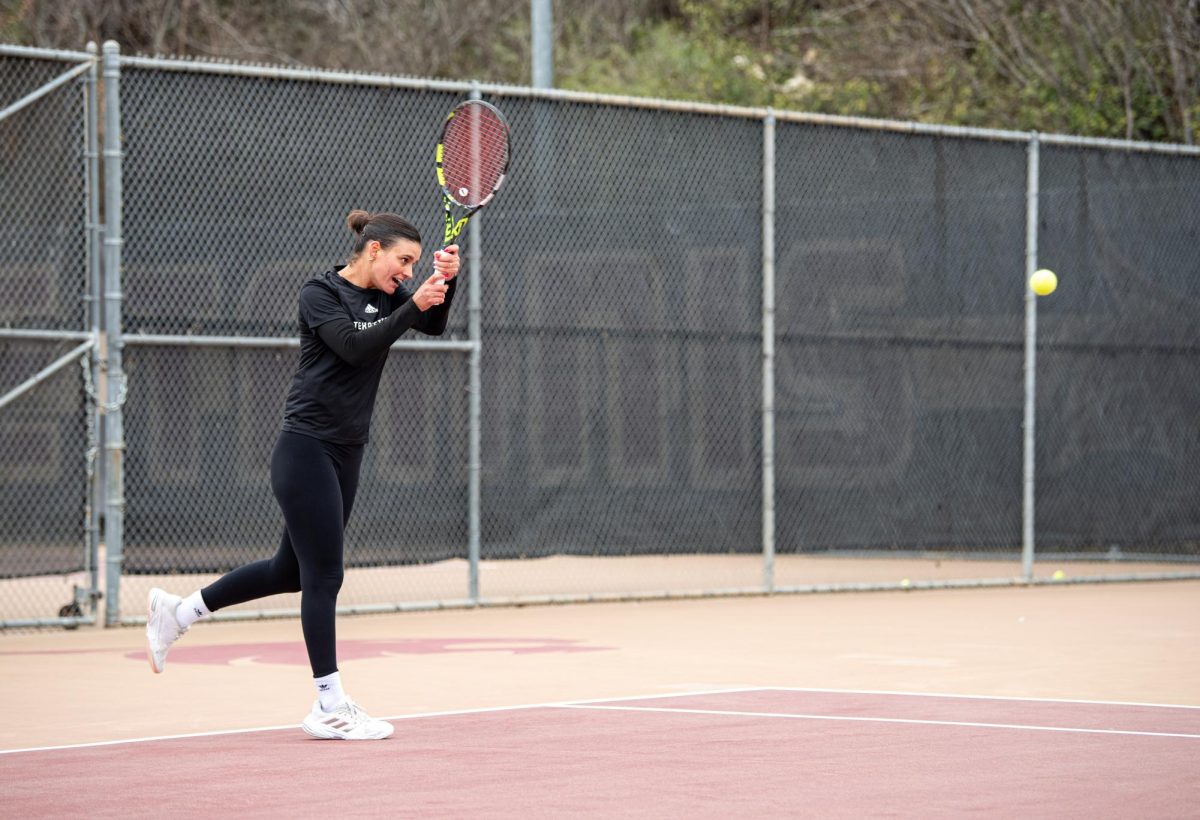 Texas State senior Sofia Fortuno hits the ball against Tarleton State on Feb. 14, 2025, at the Bobcat Tennis Complex.