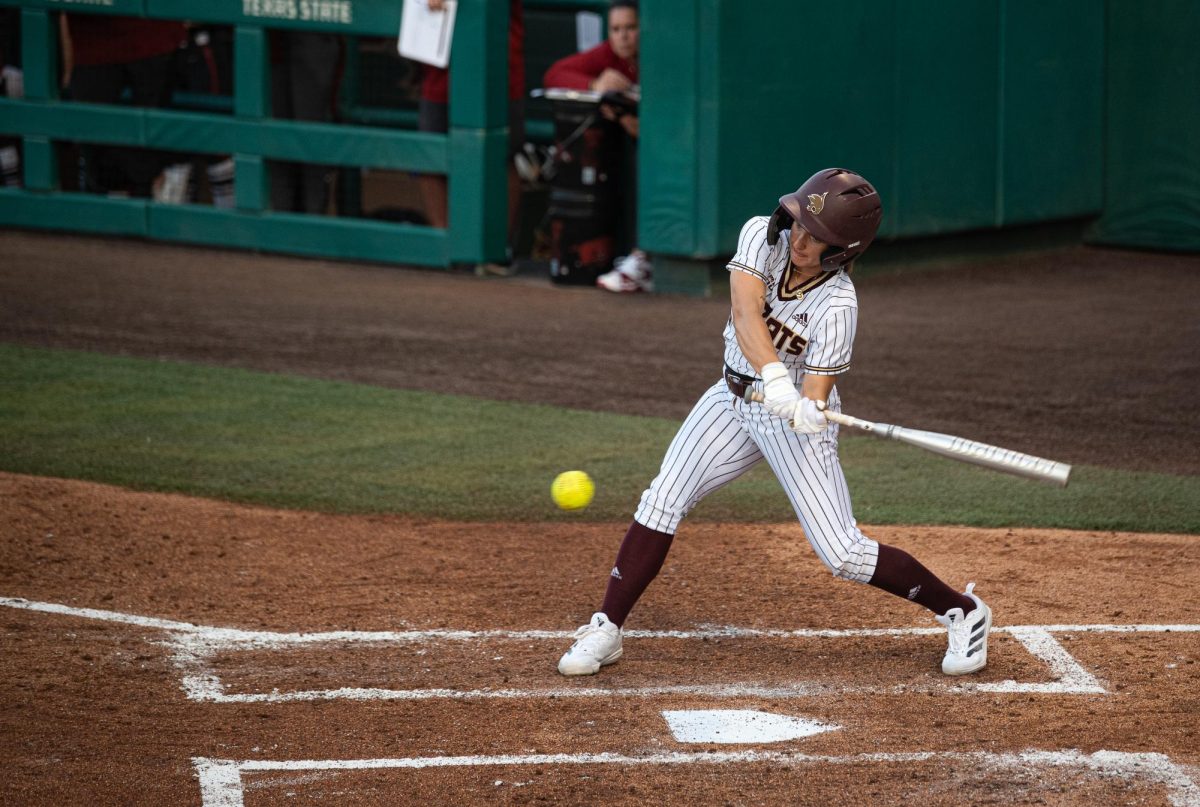 Texas State senior, #6, Ciara Trahan, collects a hit at the game against the University of Arkansas on Feb. 6, 2025.