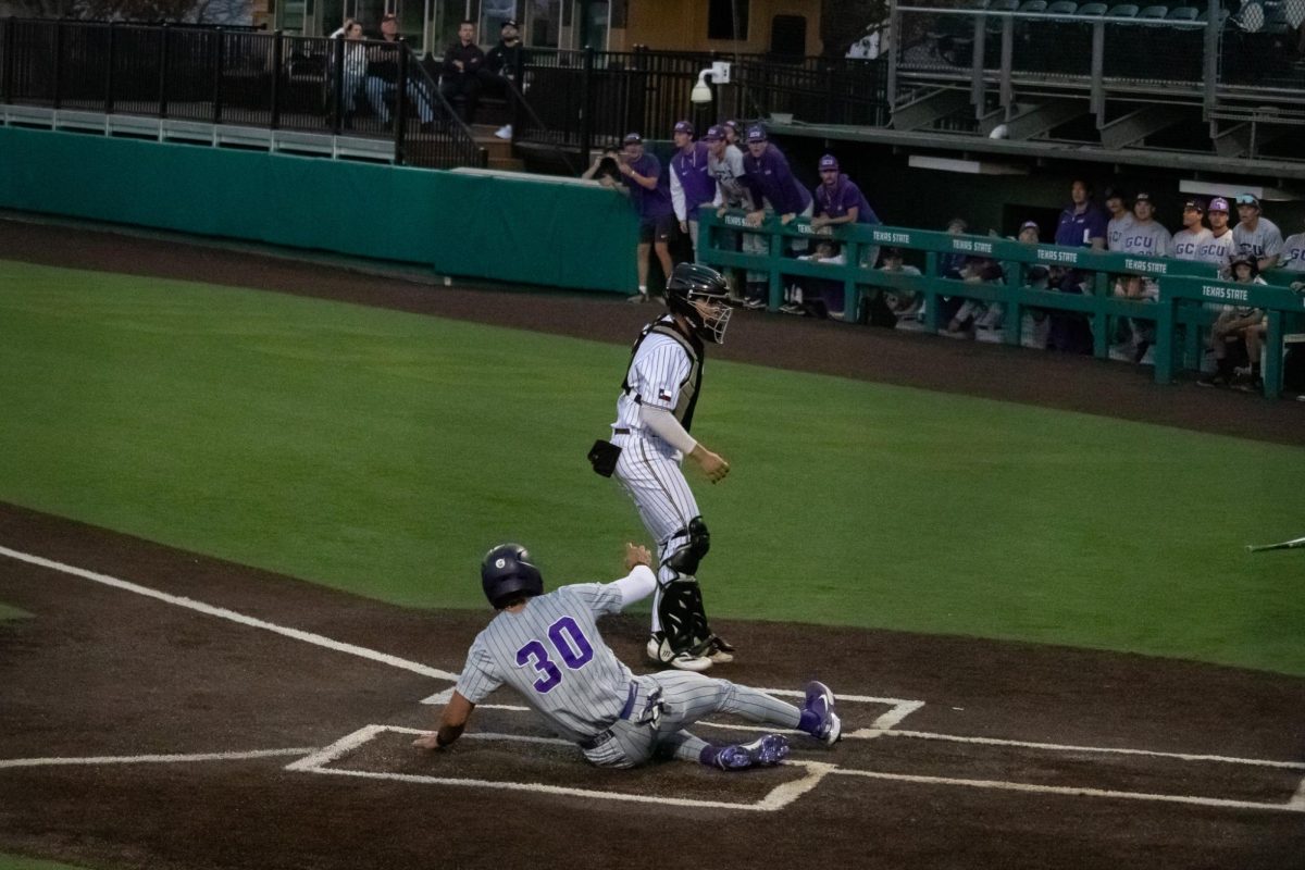 Grand Canyon University senior outfielder Michael (30) slides into home base, Friday, Feb. 28, 2025 at Bobcat Ballpark. Bobcats lost to GCU 4-0.